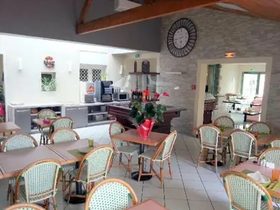 Restaurant ou autre lieu de restauration dans l'établissement Logis Hotel Restaurant Le Grand Turc