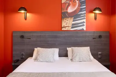 Un ou plusieurs lits dans un hébergement de l'établissement Best Western Hotel Atlantys Zenith Nantes