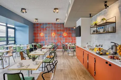 Restaurant ou autre lieu de restauration dans l'établissement Best Western Hotel Atlantys Zenith Nantes