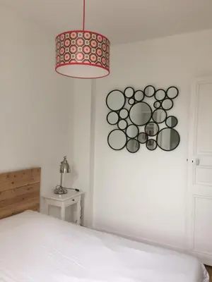Un ou plusieurs lits dans un hébergement de l'établissement Appartements de Jules & Victoire