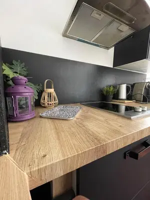 Cuisine ou kitchenette dans l'établissement La Grande Madeleine