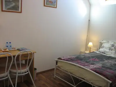 Un ou plusieurs lits dans un hébergement de l'établissement La Maison d'Héloïse