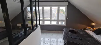 Un ou plusieurs lits dans un hébergement de l'établissement Appart'Hôtel - Chateaubriant