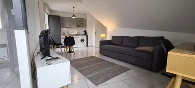 Coin salon dans l'établissement Appart'Hôtel - Chateaubriant