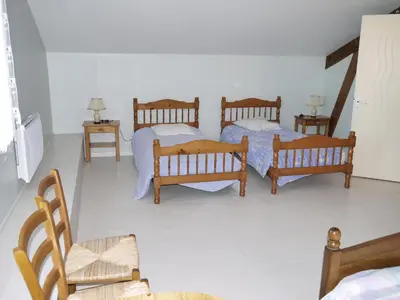 Un ou plusieurs lits dans un hébergement de l'établissement Gîte Beaupel
