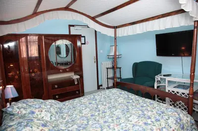 Un ou plusieurs lits dans un hébergement de l'établissement Cit'Hotel Marie Stuart