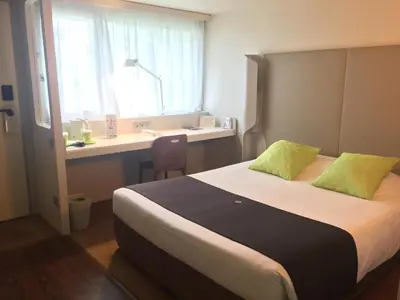 Un ou plusieurs lits dans un hébergement de l'établissement Campanile Nantes ~ Saint-Herblain