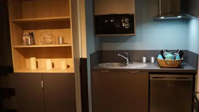 Cuisine ou kitchenette dans l'établissement Au Saint Martin 2