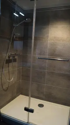 Salle de bains dans l'établissement Au Saint Martin 2