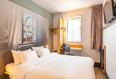 Un ou plusieurs lits dans un hébergement de l'établissement B&B HOTEL Nantes Rezé St Sébastien