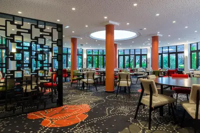 Restaurant ou autre lieu de restauration dans l'établissement Hôtel Oceania Nantes Aéroport