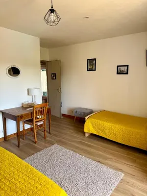 Un ou plusieurs lits dans un hébergement de l'établissement Chambre d´hôtes La Jonchère