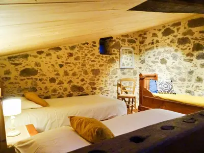 Un ou plusieurs lits dans un hébergement de l'établissement Terre et Eau Les chambres d'hotes B&B Sèvremont