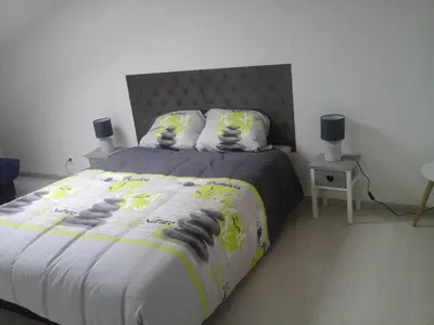 Un ou plusieurs lits dans un hébergement de l'établissement Maison au calme
