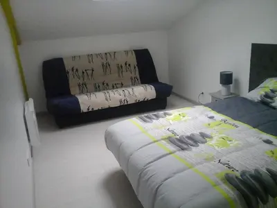 Un ou plusieurs lits dans un hébergement de l'établissement Maison au calme