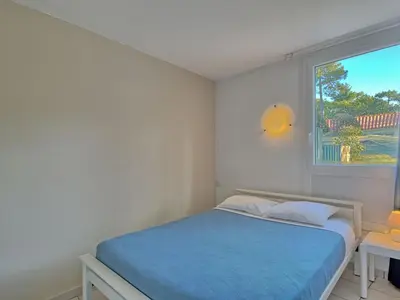 Un ou plusieurs lits dans un hébergement de l'établissement Holiday Home Hameau Océan-1 by Interhome