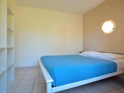 Un ou plusieurs lits dans un hébergement de l'établissement Holiday Home Hameau Océan-3 by Interhome