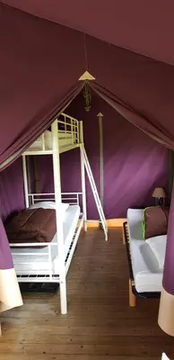 Un ou plusieurs lits dans un hébergement de l'établissement Camping Les Chagnelles