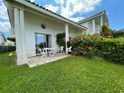 Jardin de l'établissement Appartement 4 pièces avec piscine - proche plage - Saint-Jean-de-Monts - FR-1-224C-214