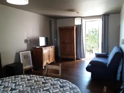 Coin salon dans l'établissement Maison de Vacances