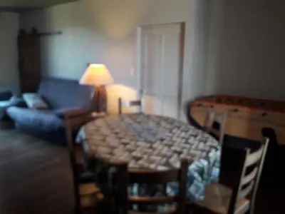 Coin salon dans l'établissement Maison de Vacances