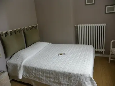 Un ou plusieurs lits dans un hébergement de l'établissement Hôtel Le Cambronne