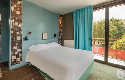 Un ou plusieurs lits dans un hébergement de l'établissement Logis Auberge De La Foret
