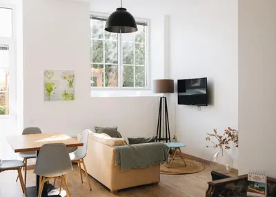 Télévision ou salle de divertissement dans l'établissement La Maison D'Olivier