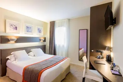 Un ou plusieurs lits dans un hébergement de l'établissement Best Western Hotel Nuit De Retz Nantes Sud