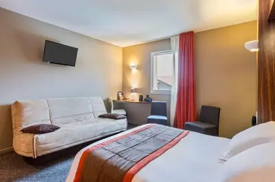 Un ou plusieurs lits dans un hébergement de l'établissement Best Western Hotel Nuit De Retz Nantes Sud