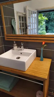 Salle de bains dans l'établissement Maison d'hôtes Les Beaux Chenes