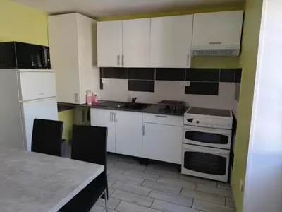Cuisine ou kitchenette dans l'établissement Apparts Gites Cholet centre