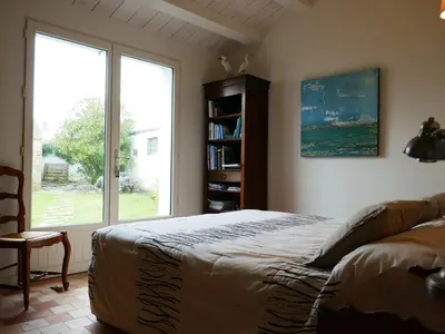 Un ou plusieurs lits dans un hébergement de l'établissement Charmante maison avec Wifi - 2 pers. - FR-1-224B-481
