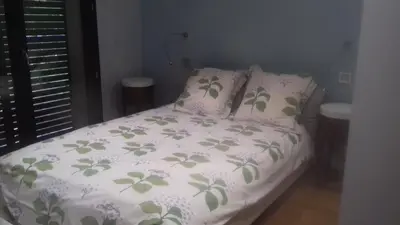 Un ou plusieurs lits dans un hébergement de l'établissement Maison passive et d'architecte