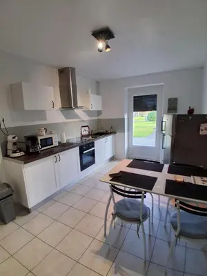 Cuisine ou kitchenette dans l'établissement La Ferme du moulin