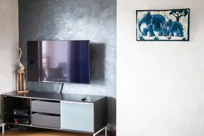 Télévision ou salle de divertissement dans l'établissement 