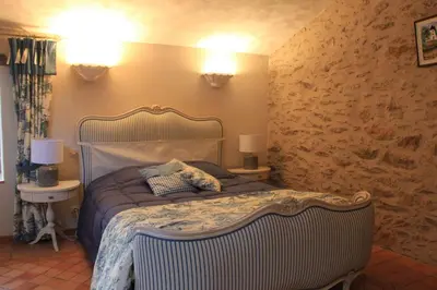 Un ou plusieurs lits dans un hébergement de l'établissement Les chambres d'hôtes de La Métairie du Bourg