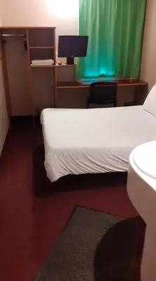 Un ou plusieurs lits dans un hébergement de l'établissement Quick Palace Nantes La Beaujoire