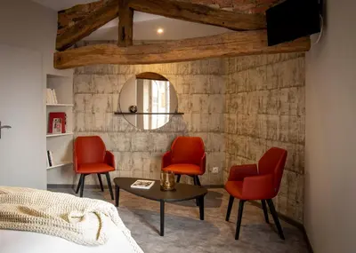 Coin salon dans l'établissement Hotel - Restaurant Les 3 Piliers