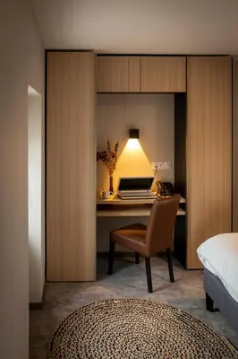 Un ou plusieurs lits dans un hébergement de l'établissement Hotel - Restaurant Les 3 Piliers