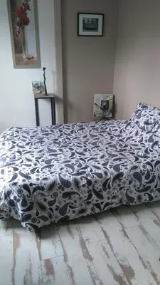 Un ou plusieurs lits dans un hébergement de l'établissement Chambre privée chez un particulier