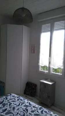 Un ou plusieurs lits dans un hébergement de l'établissement Chambre privée chez un particulier