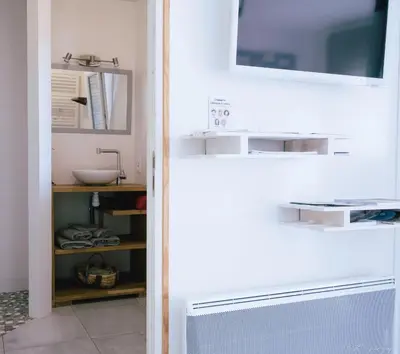 Cuisine ou kitchenette dans l'établissement Gîte 