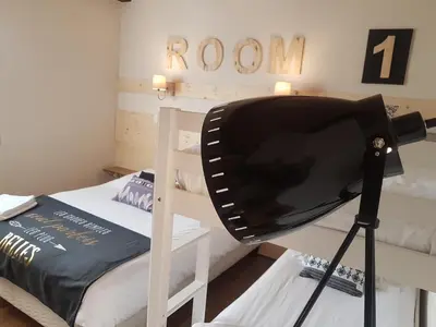 Un ou plusieurs lits dans un hébergement de l'établissement Hôtel Le Sainte Florence