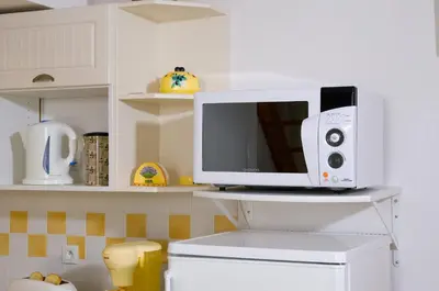 Cuisine ou kitchenette dans l'établissement Madame Vacances les Mas de Saint Hilaire