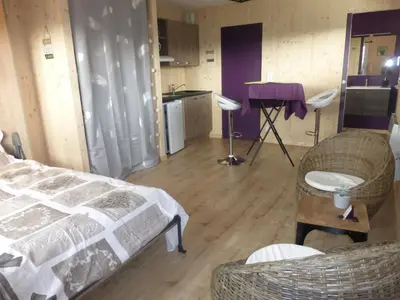 Un ou plusieurs lits dans un hébergement de l'établissement La cabane du Bonheur