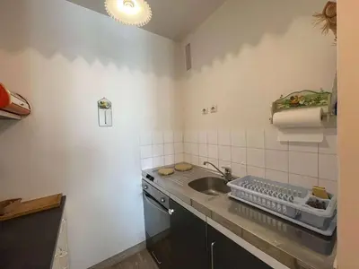 Cuisine ou kitchenette dans l'établissement Appartement 2 pièces proche mer avec loggia - Saint-Hilaire-de-Riez - FR-1-224C-625