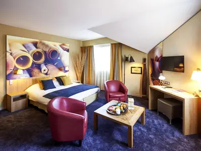 Coin salon dans l'établissement ibis Styles Cholet