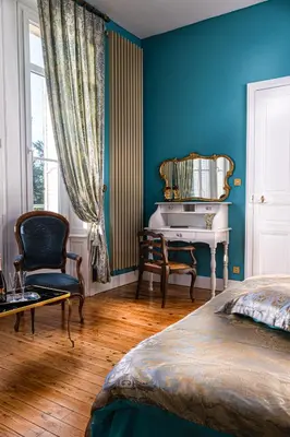 Un ou plusieurs lits dans un hébergement de l'établissement Le Château des Tourelles en Vendée