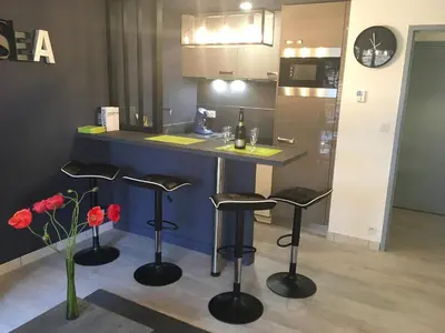Cuisine ou kitchenette dans l'établissement Le Belouga